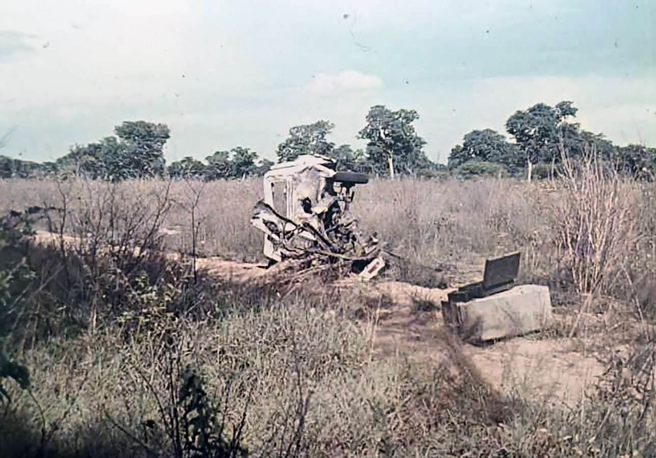 A broken computer in a field AI-generated content may be incorrect.