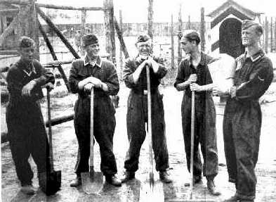 A group of men holding shovels AI-generated content may be incorrect.