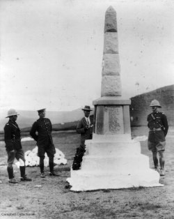A group of men standing next to a monument

AI-generated content may be incorrect.