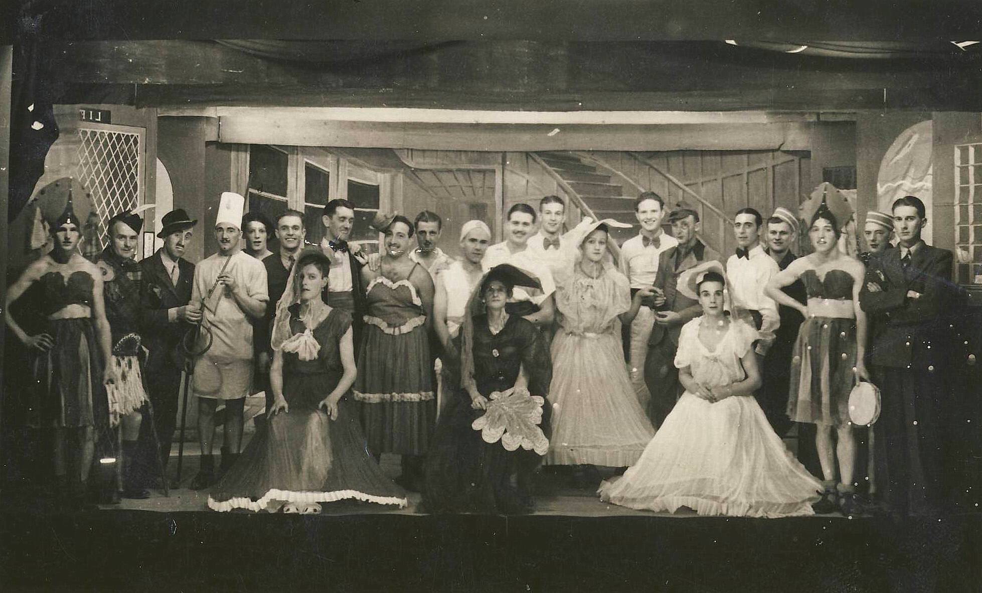 A group of people posing for a photo AI-generated content may be incorrect.