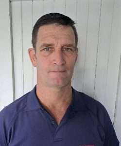 A person in a blue shirt AI-generated content may be incorrect.