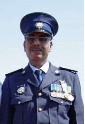 A person in a military uniform AI-generated content may be incorrect.