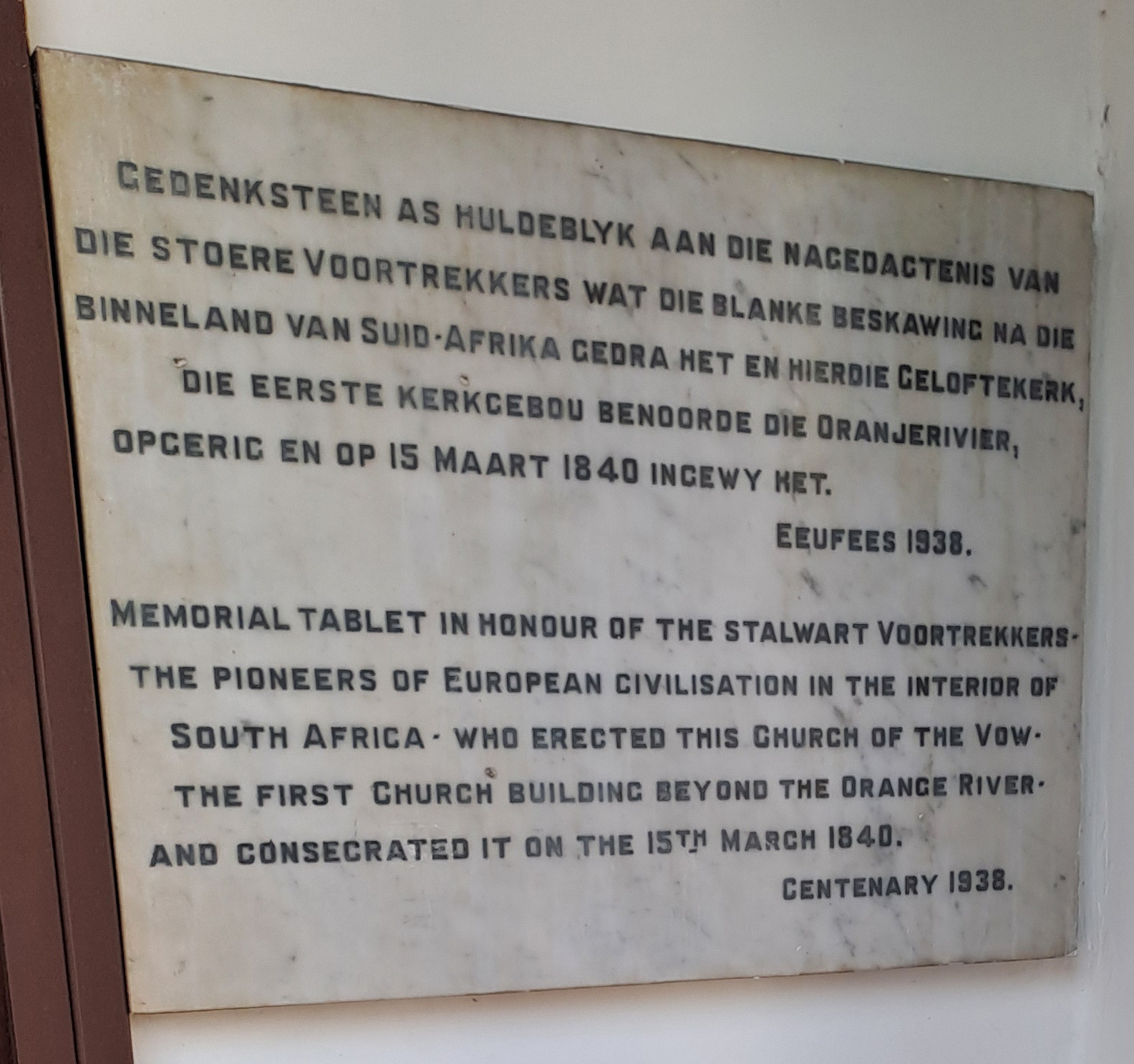 A sign on a wall AI-generated content may be incorrect.