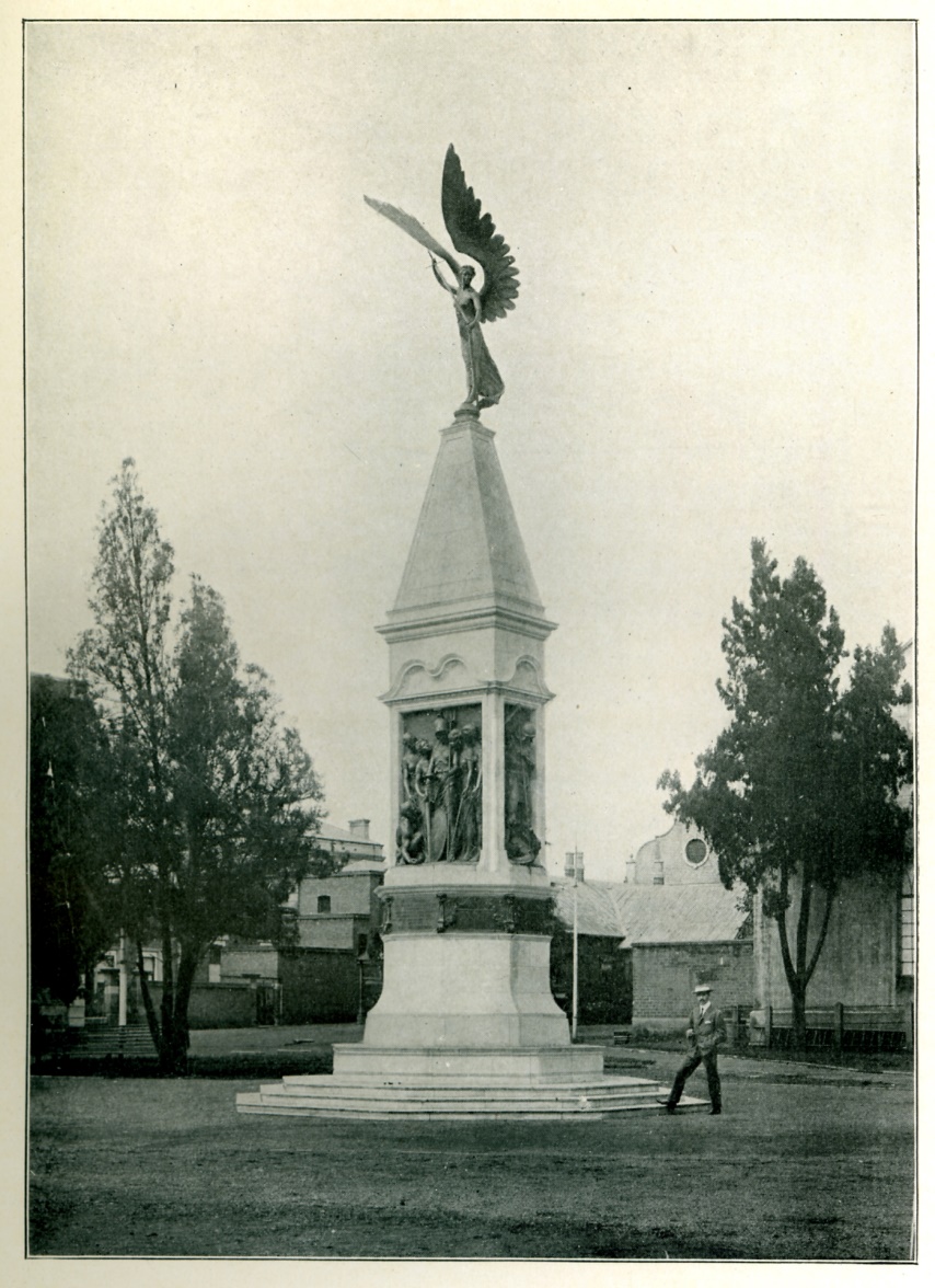 A statue of a person with wings on top of a monument AI-generated content may be incorrect.