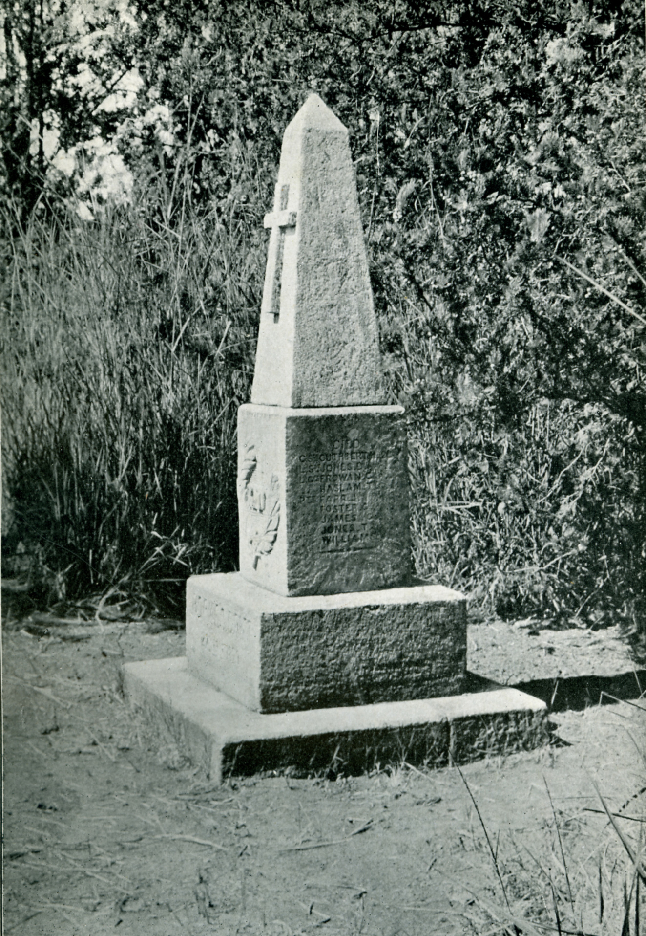 A stone monument with a cross on it AI-generated content may be incorrect.