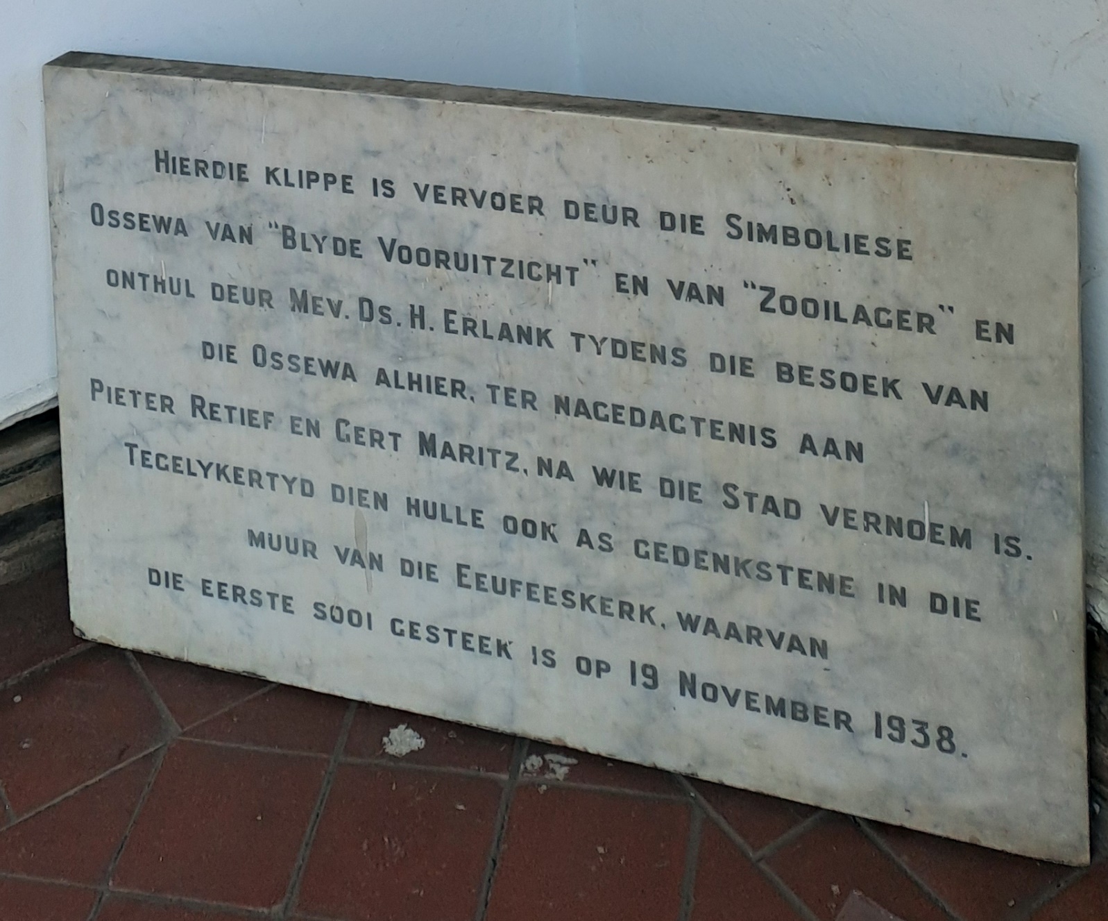 A stone plaque with text on it AI-generated content may be incorrect.