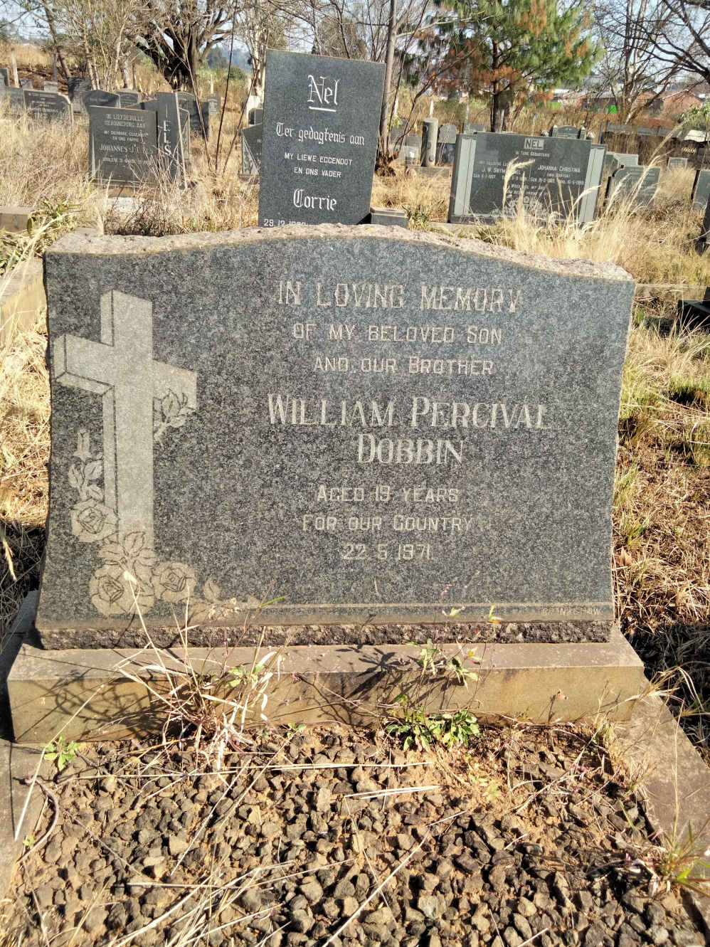 A tombstone in a cemetery

AI-generated content may be incorrect.