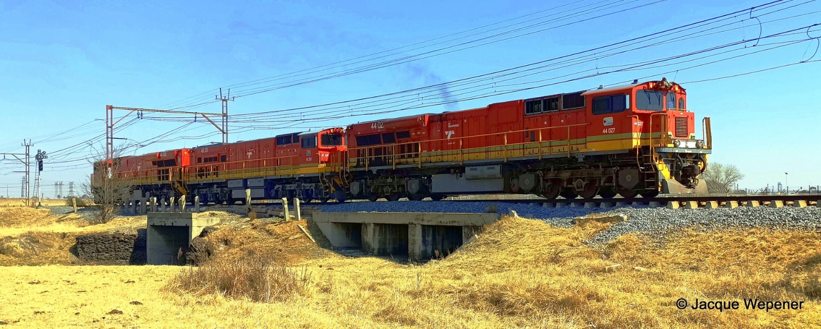 A train on a bridge AI-generated content may be incorrect.