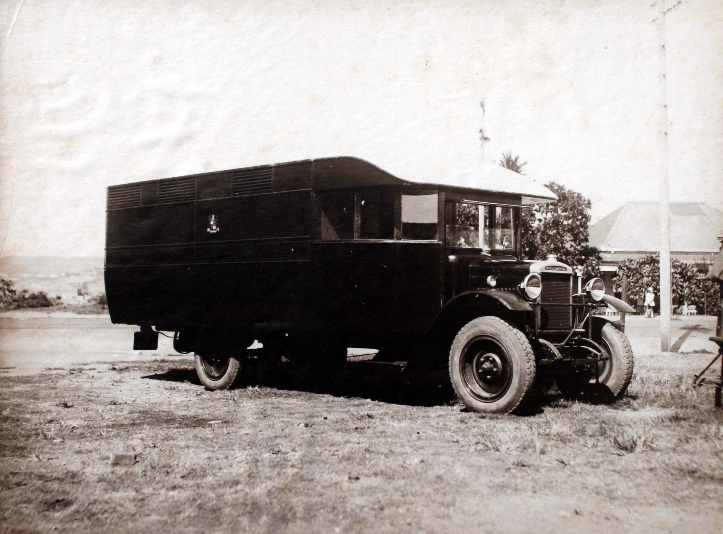 A black truck parked on the ground

AI-generated content may be incorrect.