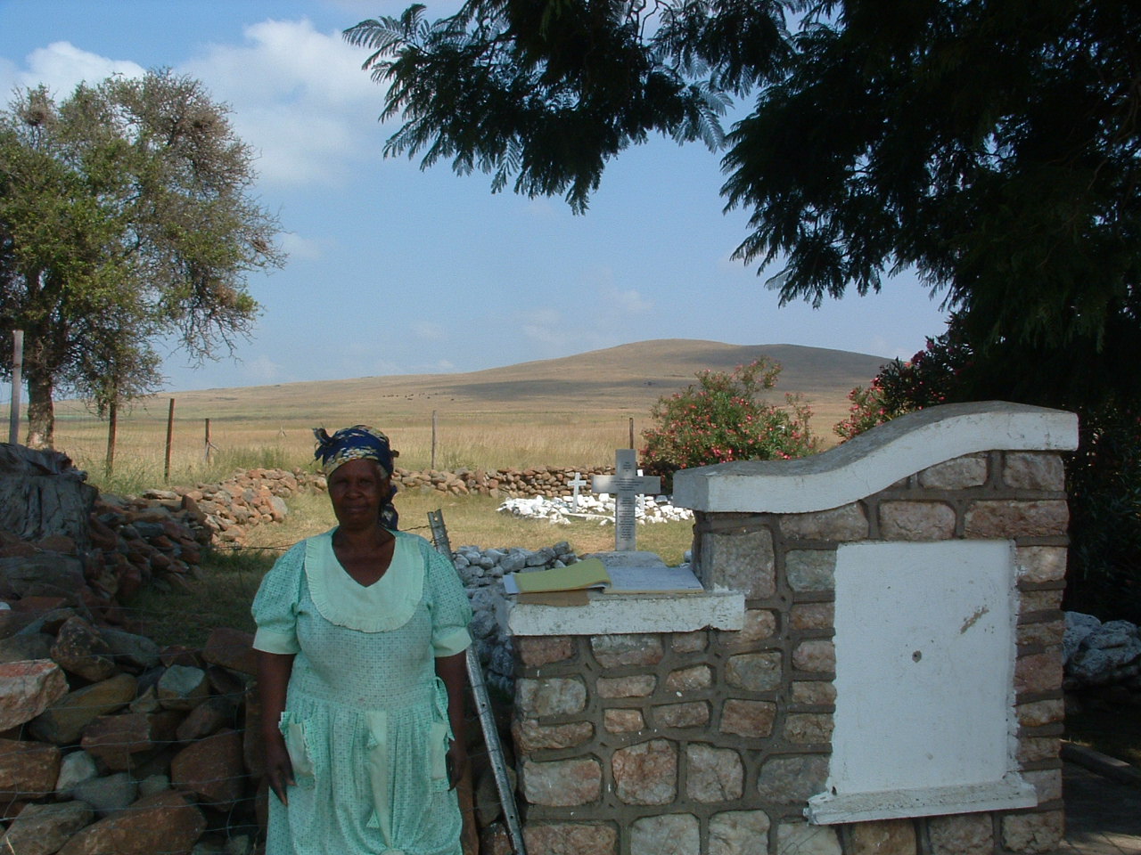 A person standing in front of a stone wall

AI-generated content may be incorrect.