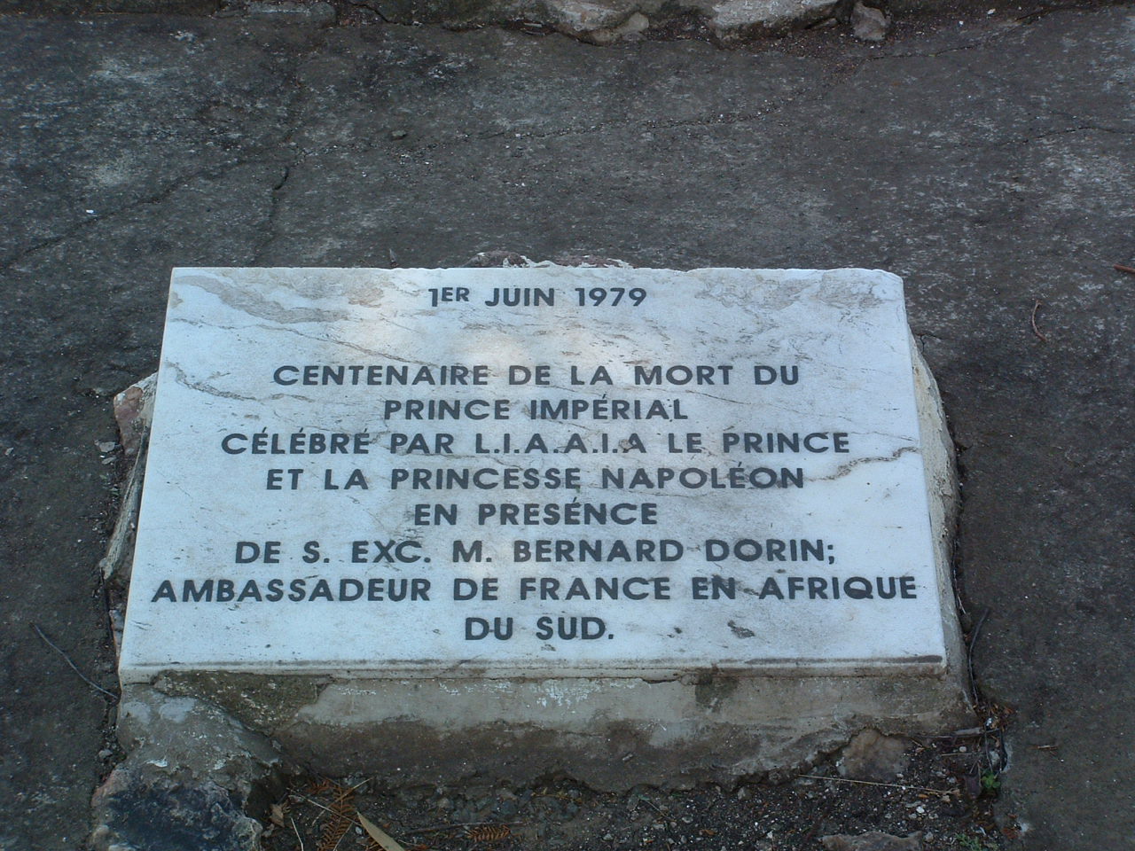 A stone with text on it

AI-generated content may be incorrect.