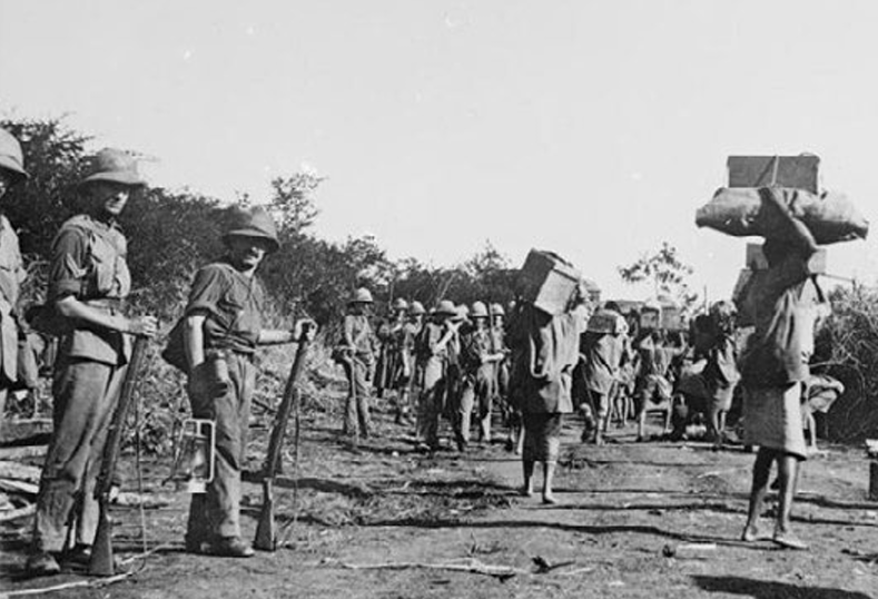 A group of soldiers carrying equipment

AI-generated content may be incorrect.