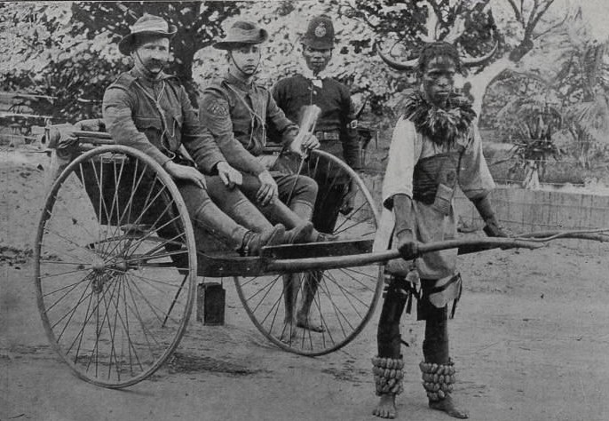 A group of men in clothing in a cart AI-generated content may be incorrect.