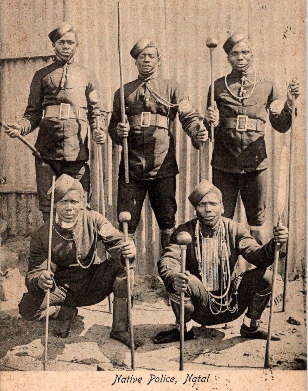 A group of men in military uniforms AI-generated content may be incorrect.