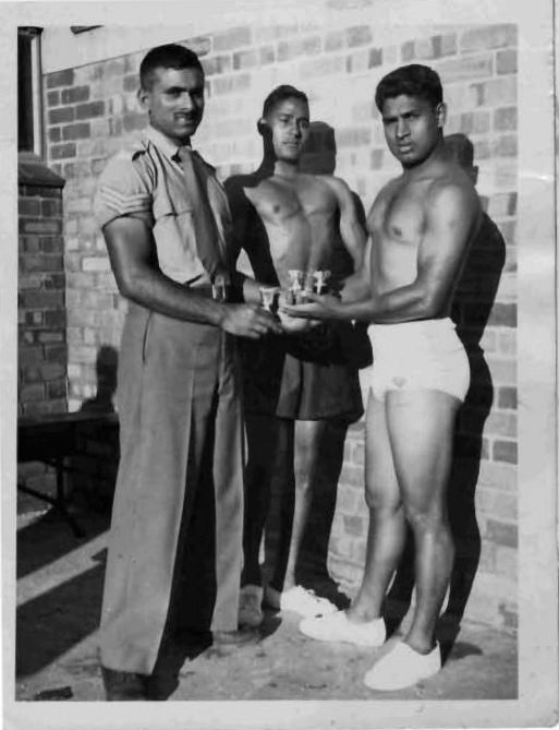 A group of men holding cups

AI-generated content may be incorrect.