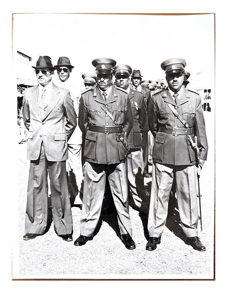 A group of men in military uniforms

AI-generated content may be incorrect.