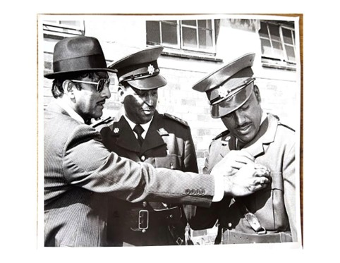 A group of men in military uniforms

AI-generated content may be incorrect.