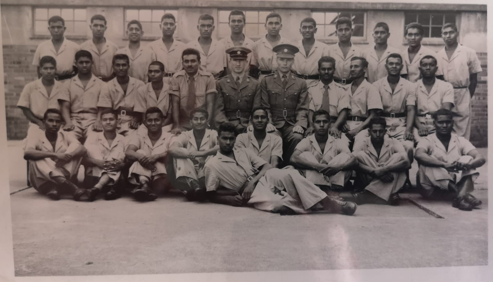 A group of men posing for a photo

AI-generated content may be incorrect.