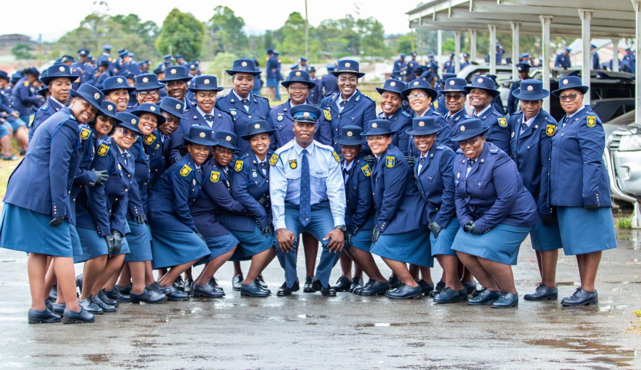 A group of people in uniform AI-generated content may be incorrect.