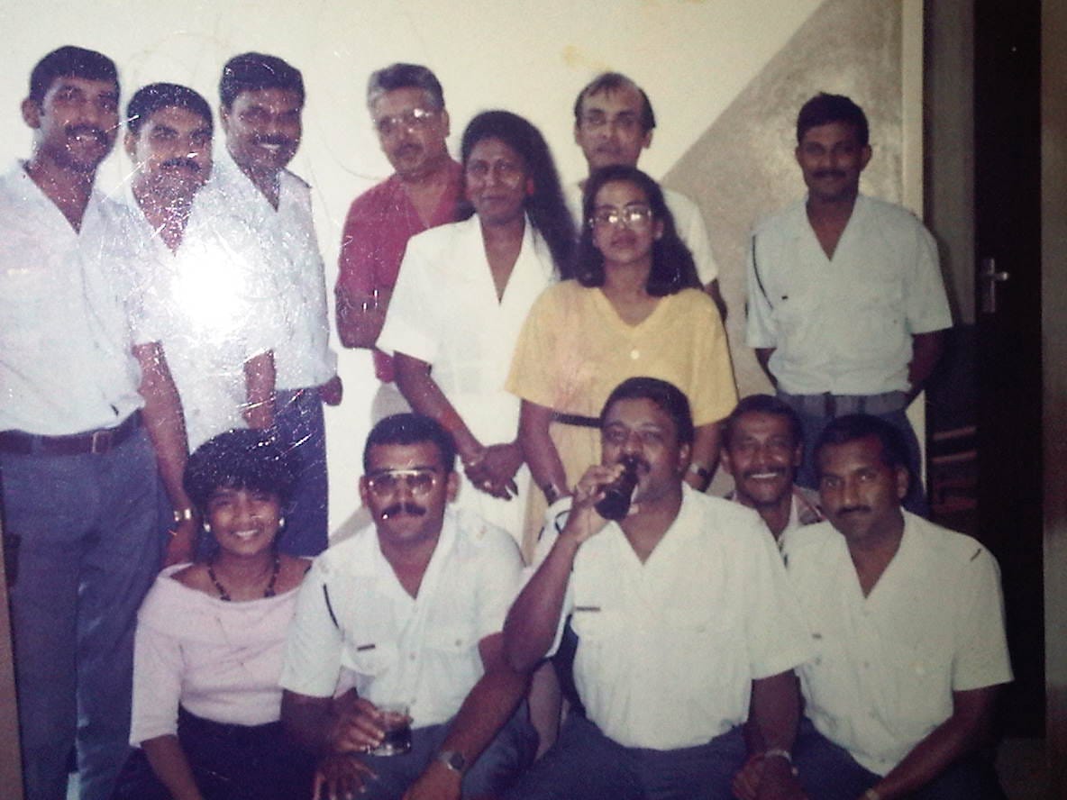 A group of people posing for a photo

AI-generated content may be incorrect.