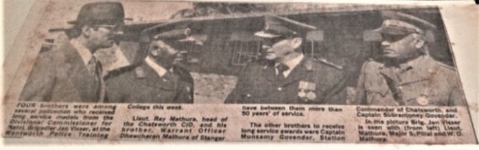 A newspaper with a picture of two men in military uniforms

AI-generated content may be incorrect.