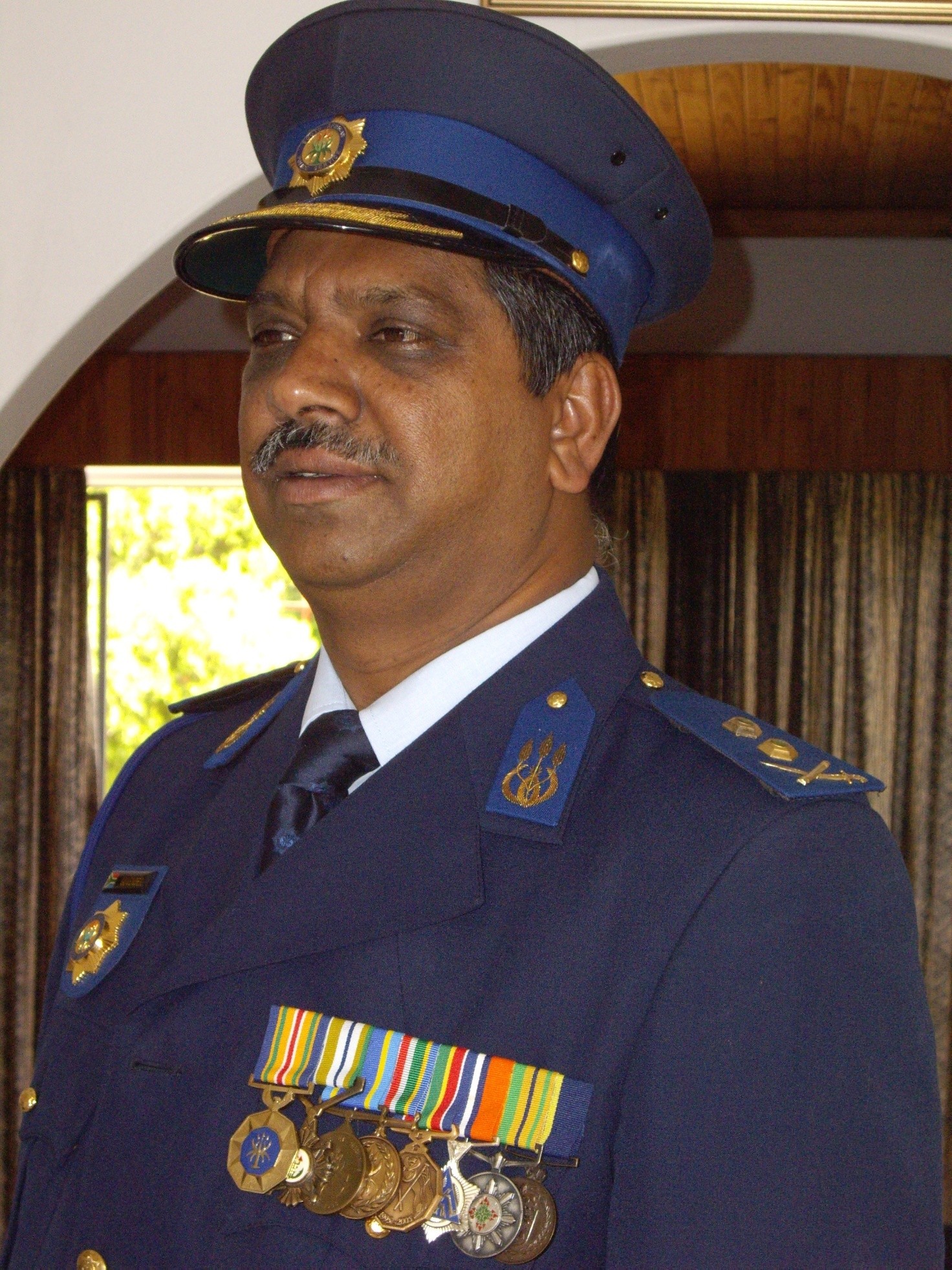 A person in a military uniform
AI-generated content may be incorrect.