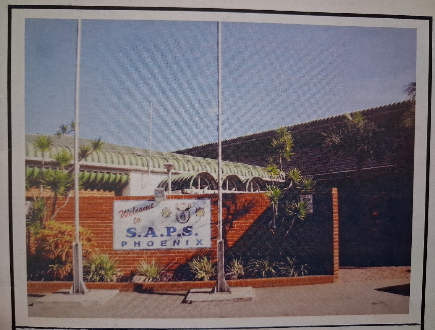 A sign on a brick wall AI-generated content may be incorrect.