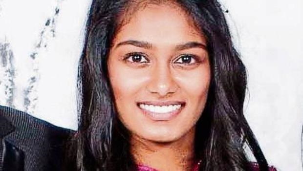 A close-up of a person smiling
AI-generated content may be incorrect.