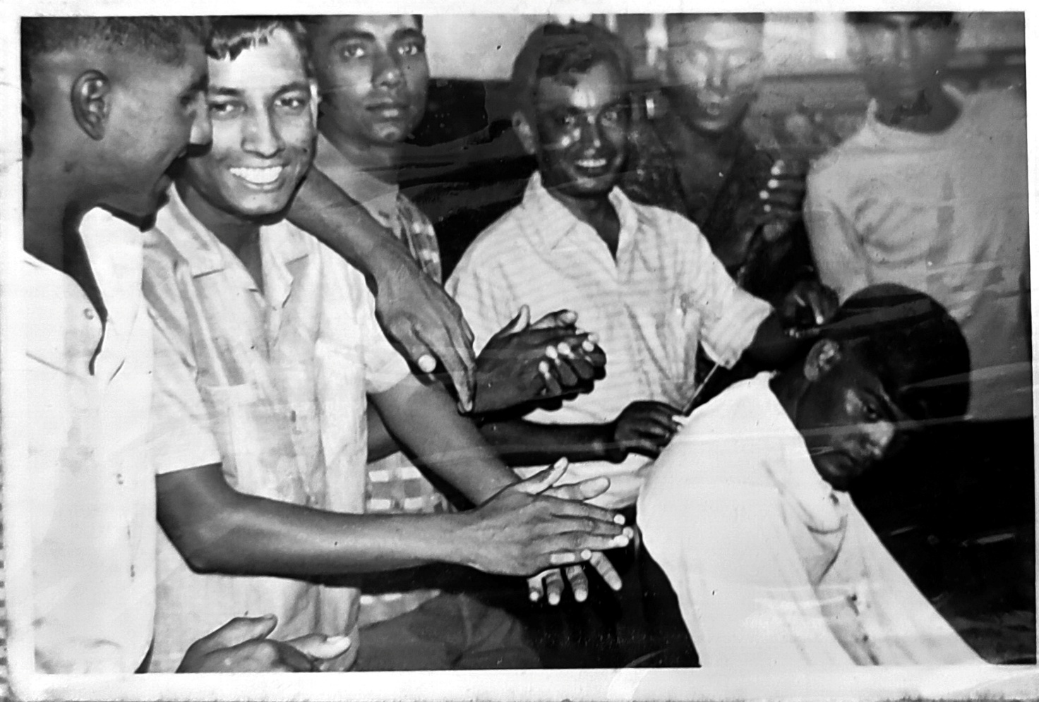 A group of people clapping AI-generated content may be incorrect.