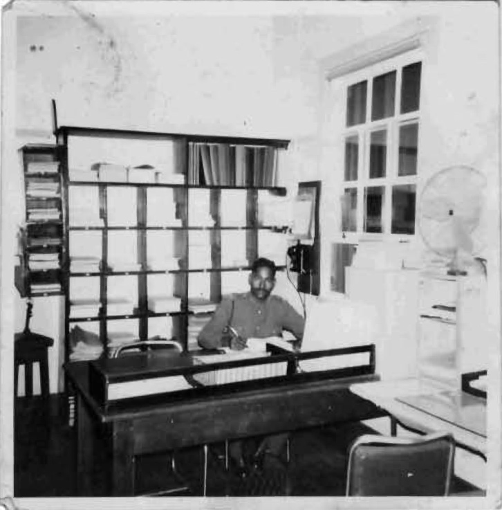 A person sitting at a desk
AI-generated content may be incorrect.