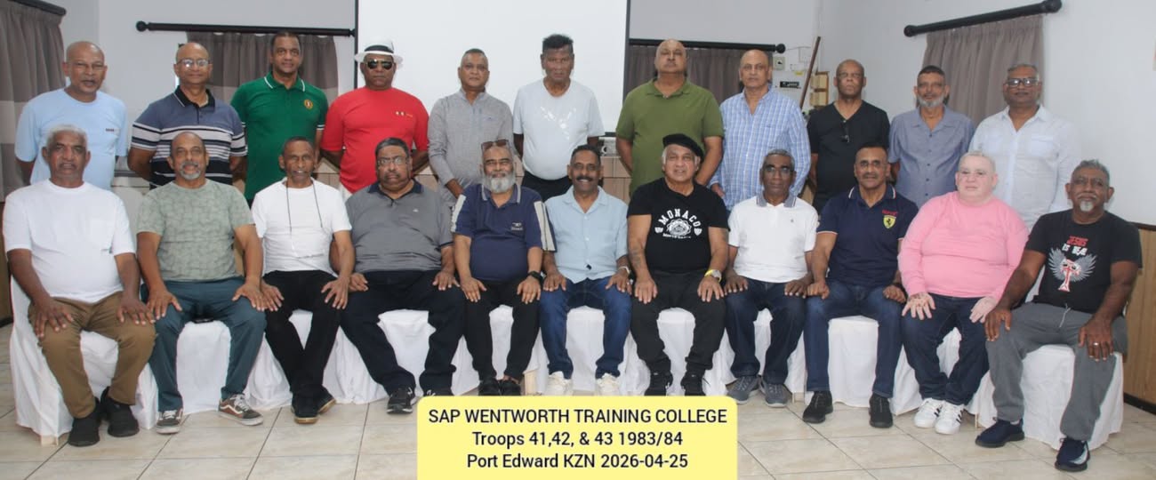 A group of men posing for a photo AI-generated content may be incorrect.