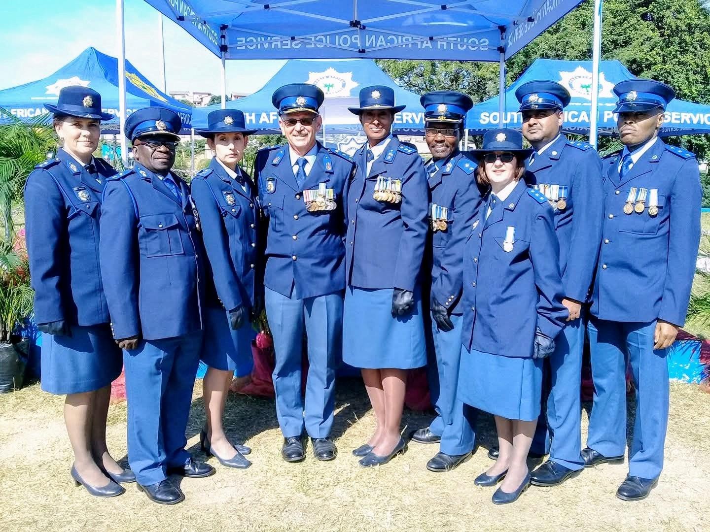 A group of people in blue uniforms AI-generated content may be incorrect.