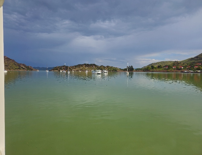 A body of water with boats in it AI-generated content may be incorrect.