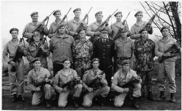 A group of soldiers posing for a photo AI-generated content may be incorrect.
