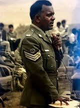 A person in a military uniform AI-generated content may be incorrect.