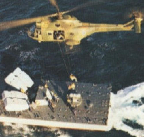 A helicopter lifting a landing gear AI-generated content may be incorrect.