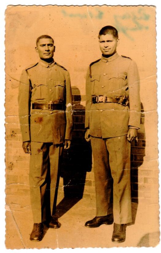A couple of men in military uniforms
AI-generated content may be incorrect.