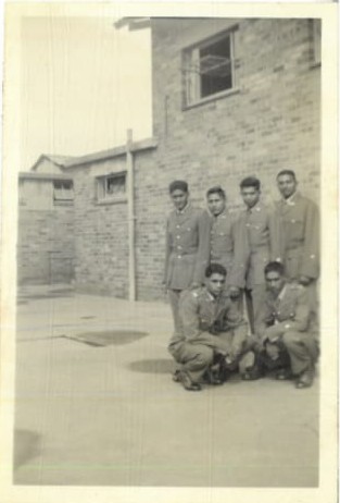 A group of men in uniform
AI-generated content may be incorrect.