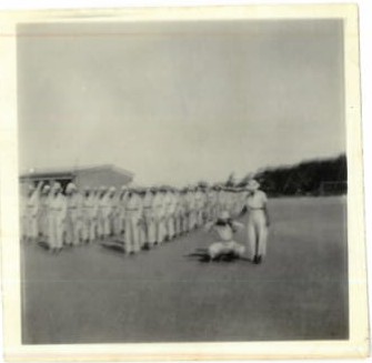 A group of people saluting
AI-generated content may be incorrect.