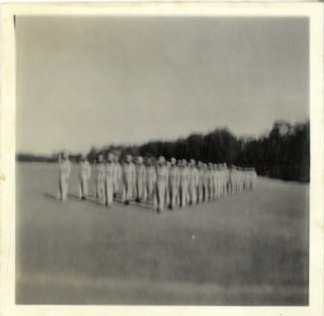 A group of people standing in a line
AI-generated content may be incorrect.