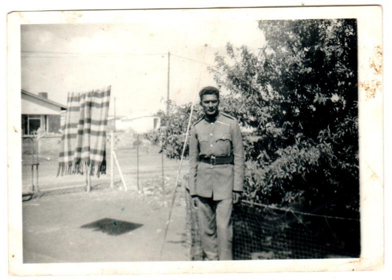 A person in uniform standing outside
AI-generated content may be incorrect.