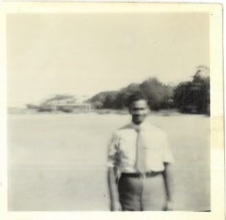 A person standing in front of a beach

AI-generated content may be incorrect.
